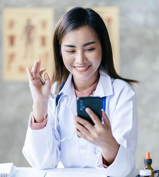 Doctor using a laptop for online medical learning